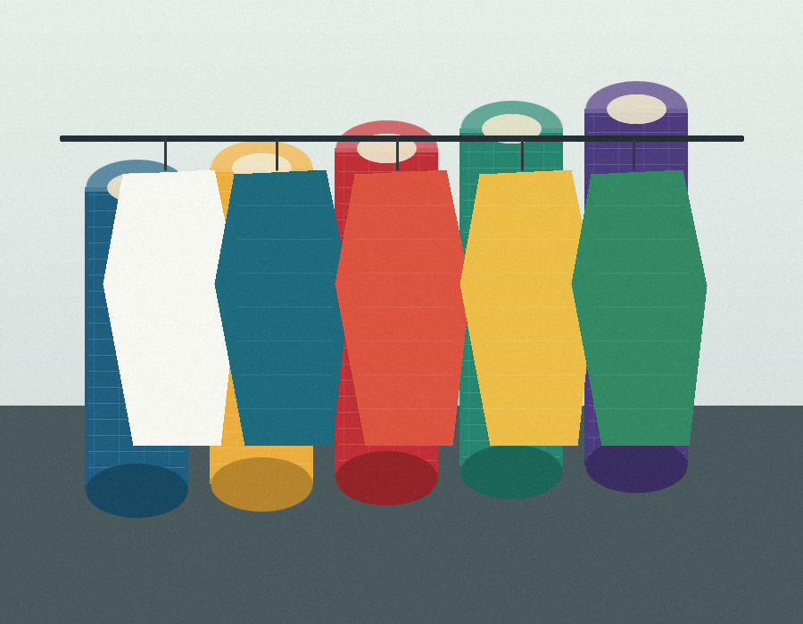 Colorful garments and fabric rolls arranged for textile merchandising